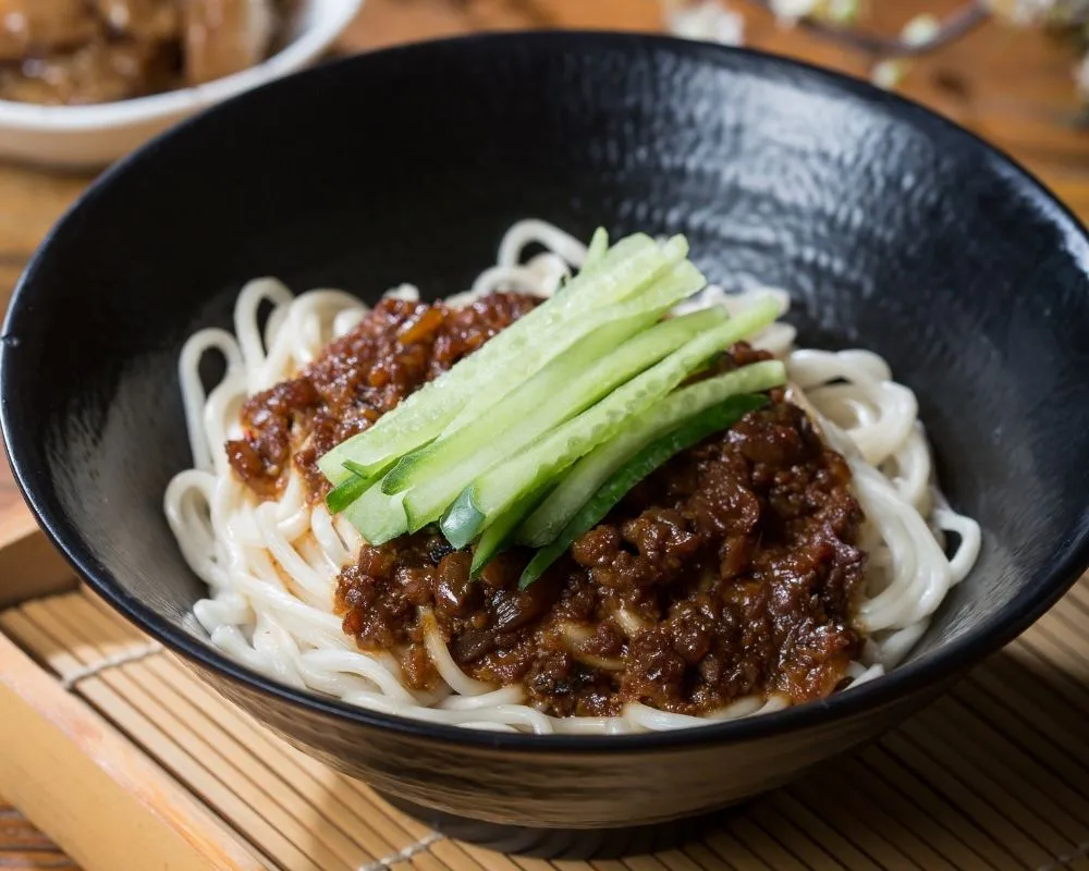 Fried sauce noodles with cucumber strips at ZOEN RAMEN & POKE, Ramen Restaurant in College Station